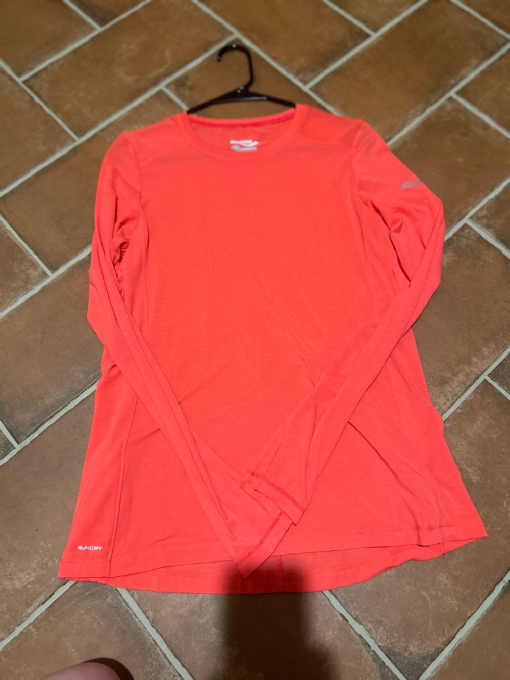 Saucony bright orange run shirt